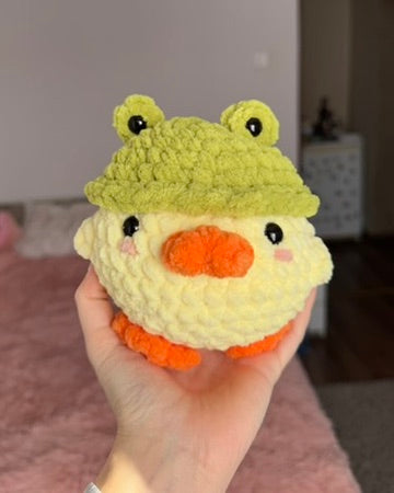 Puișor cu pălărie